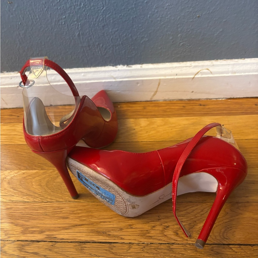 Super cute red Jessica Simpson heels. Some scuff marks.